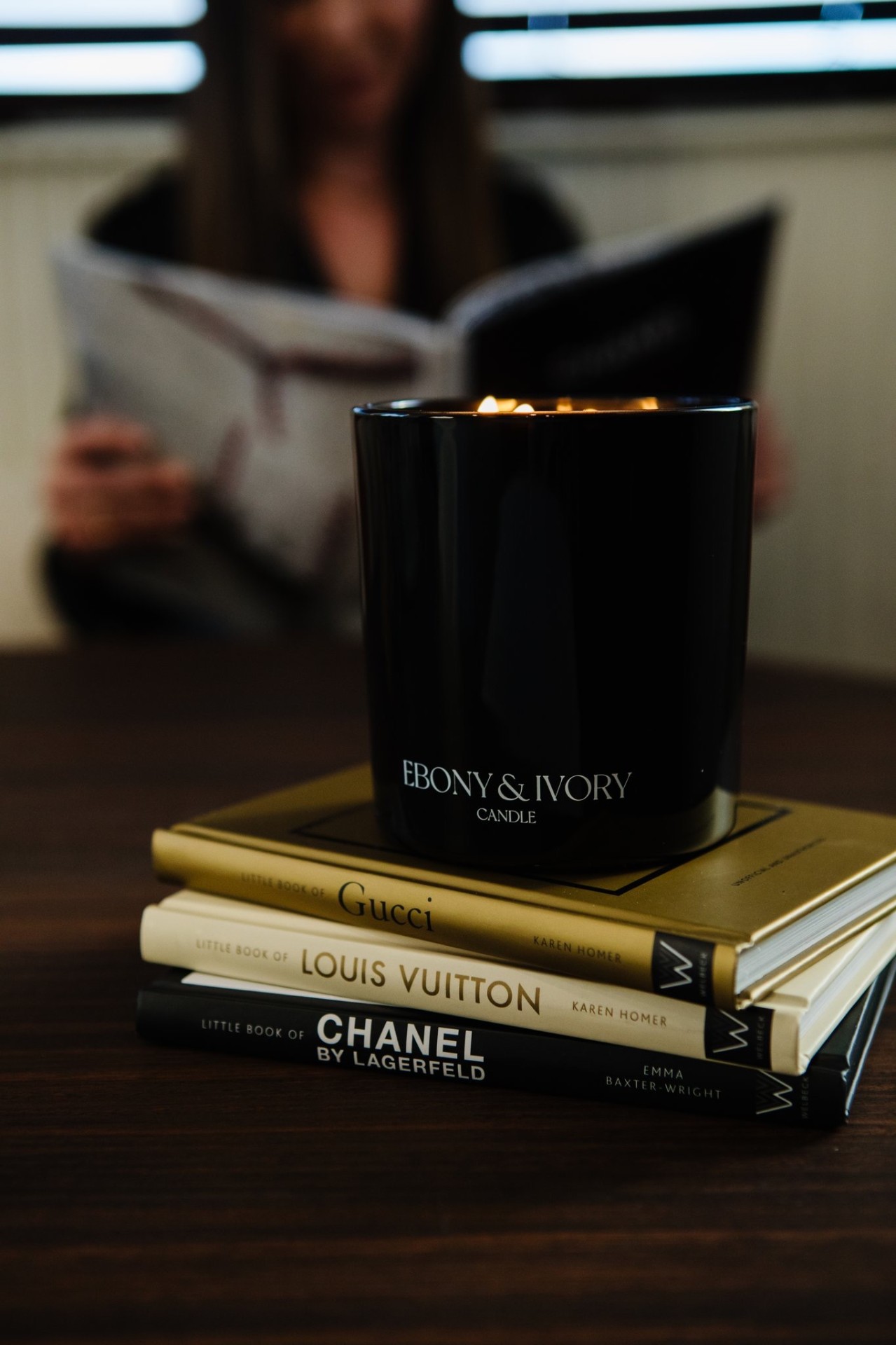 Ebony & Ivory candle on designer books